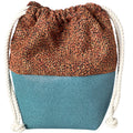 Le Sac washbag in brown boucle and teal faux leather