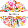 Oversized floral scrunchie in pinks, oranges yellows and greens handmade by MAVEN FARGO